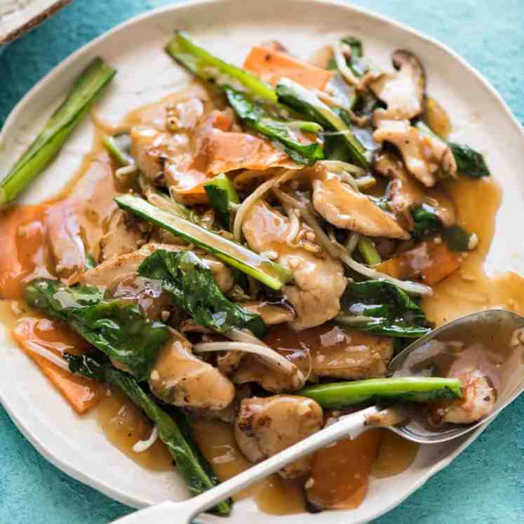 Chop Suey / Chicken Stir Fry on a rustic white plate, ready to be served