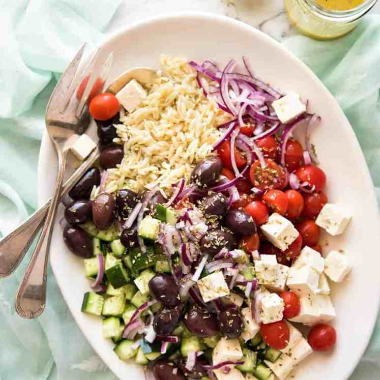 Greek Lemon Orzo Salad (Risoni) - All the fixings of a Greek Salad tossed through orzo / risoni and dressed with a gorgeous zesty lemon vinaigrette. recipetineats.com