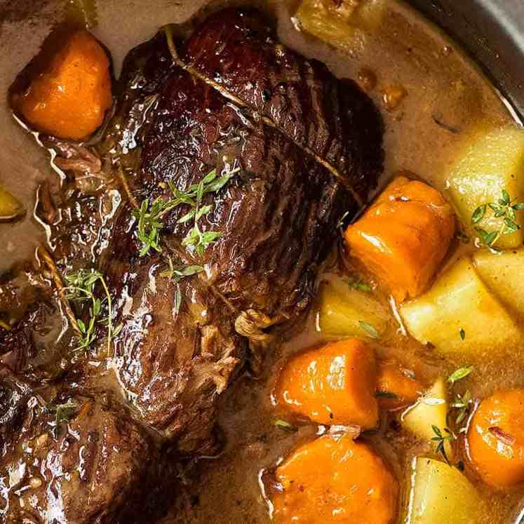 Slow Cooker Pot Roast in a slow cooker, ready to be eaten